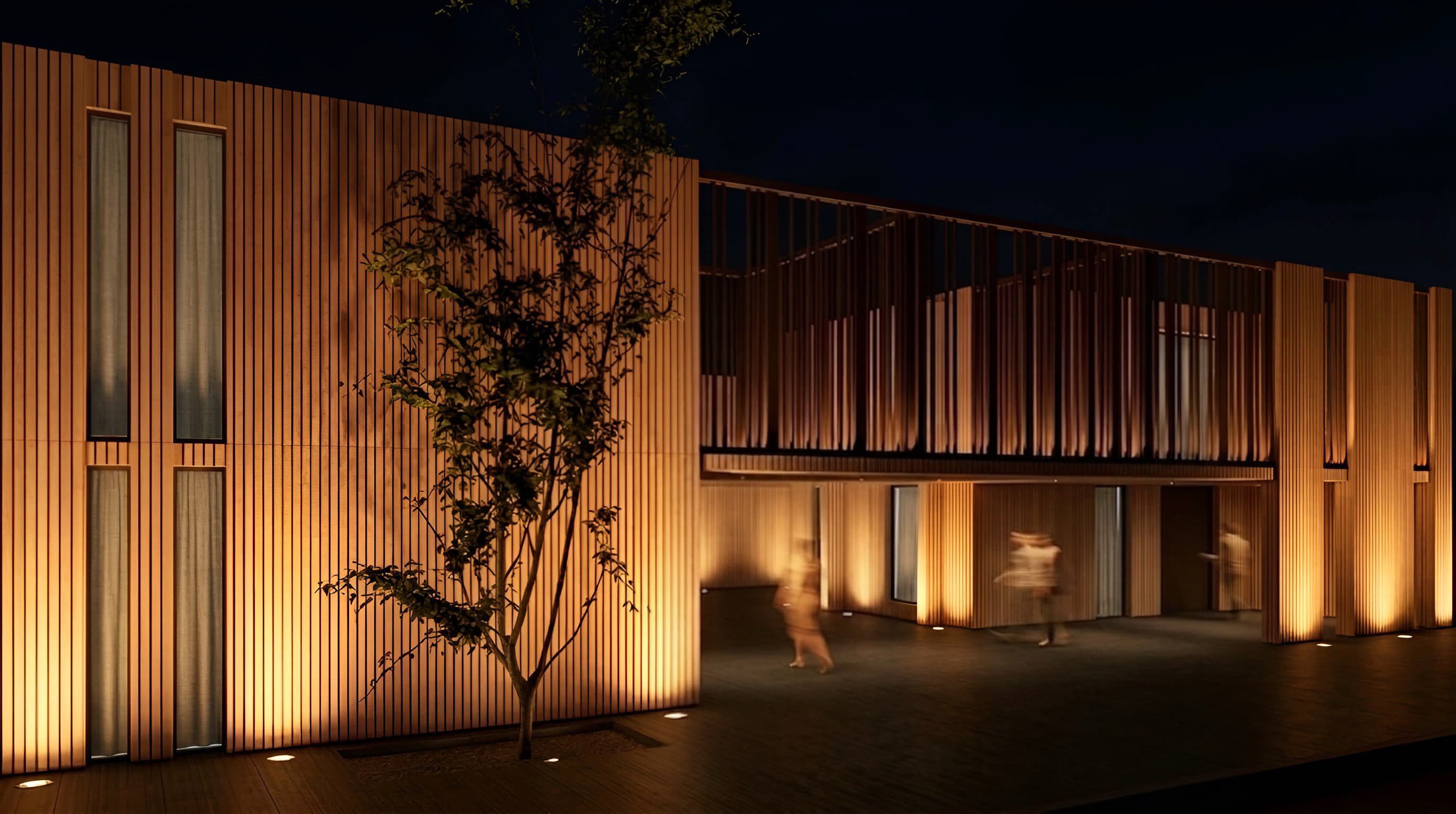 Render exterior nocturno del desarrollo